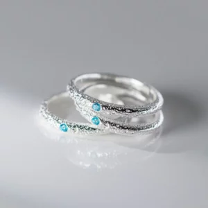 Stříbrný prsten tepaný s Akvamarínem